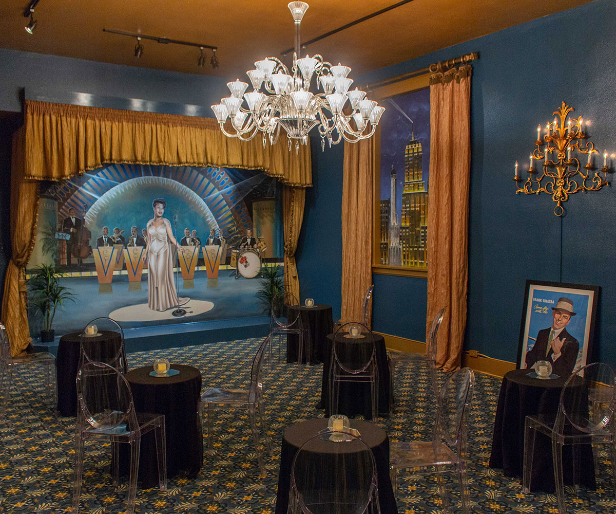 Photo of a room with a mural of Ella Fitzgerald